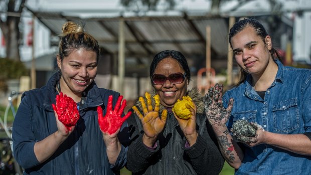 Naidoc Week celebrations 2017- 10 organisations competed in a damper cook-off at the Aboriginal tent embassy. ??Mixing the dough in the colours of the aboriginal flag are the team from the Indigenous Health department (from left) ?Amber Jarrett, Sylvia Rosas and Elizabeth Mitchell.? ?Photo by Karleen Minney.