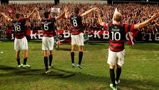 The Western Sydney Wanderers celebrate after defeating Adelaide United at Parramatta Stadium on December 21.