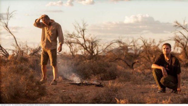 Instant connection: Guy Pearce and Robert Pattinson on the set of <i>The Rover</i>.