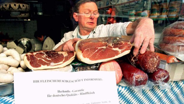 For the chop ... a Hamburg butcher with a notice guaranteeing meat origins in 1996. Beef labelling laws to control the spread of BSE resulted in the formation of one of the longest words in German.