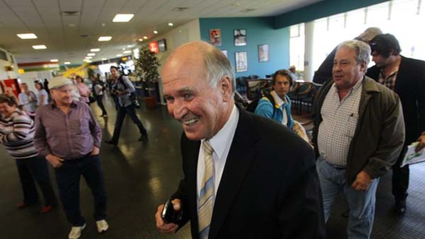 ''I haven't experienced any hostility'' ... Tony Windsor arriving at Tamworth Airport yesterday.