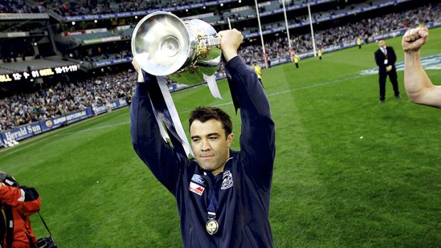 Geelong coach Chris Scott with the premiership cup.