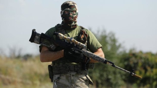 Pro-Russia rebel sniper 'Angel' at a checkpoint on the outskirts Shakhtersk on Thursday.