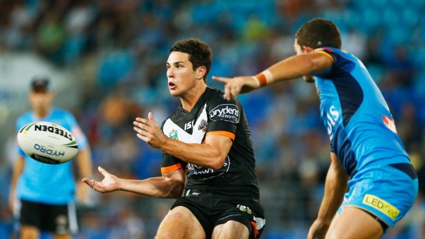 Wests Tigers No.6 Mitchell Moses in action against the Titans.