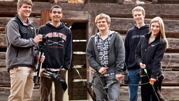 Eddie Mansius, from left, Cullen McMillian, Nick Rhyne, Duncan Rule and Maddie Moore have had 4.5 million views of their 10 instalments of "The Hunger Games''. Cullen joined the original four North Carolina high school students after the first video.