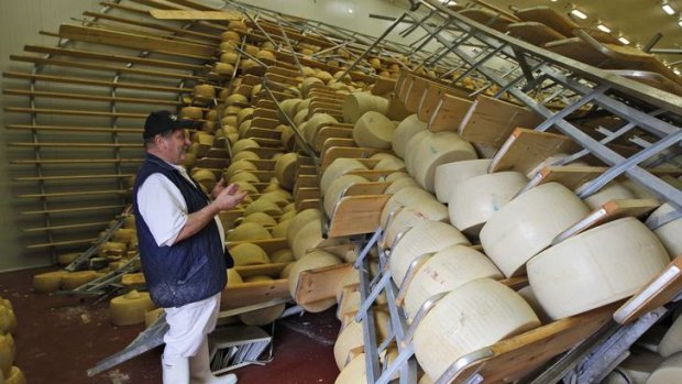 Sunday's earthquake left cheese producers north of Bologna devastated, as tremors brought about 300,000 parmesan wheels down like dominoes.