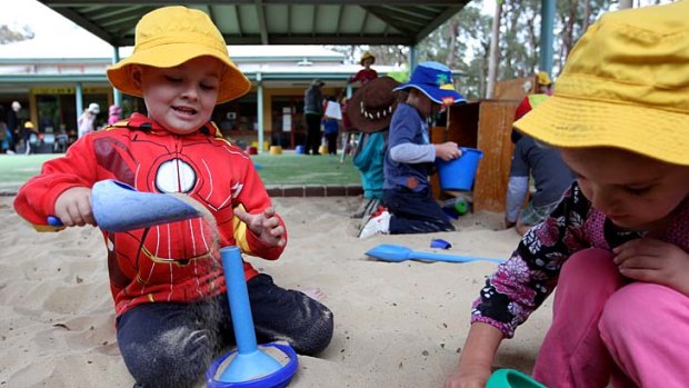 On his way &#8230; Gary, who is in the Ngroo program, plays with his friend Abbygail at Grays Lane Children's Centre in Cranebrook.