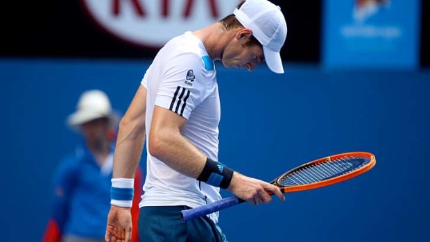 Andy Murray appeared to have some back pain while playing Stephane Robert.