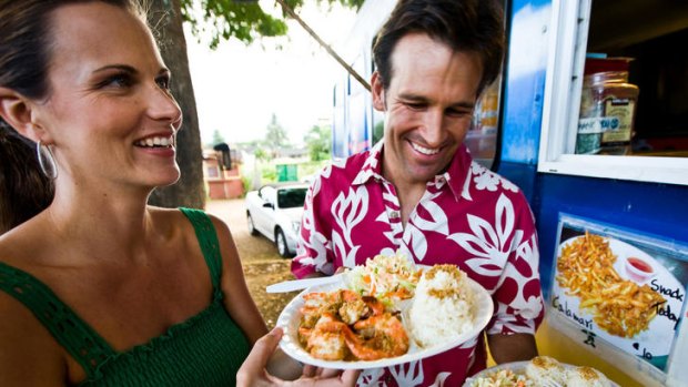 Island flavour ... a couple at a shrimp truck in Oahu.
