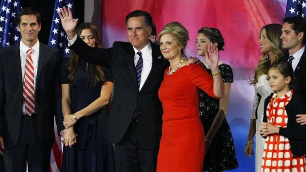 Lost to Obama ... US Republican presidential nominee Mitt Romney stands on stage with his wife Ann.