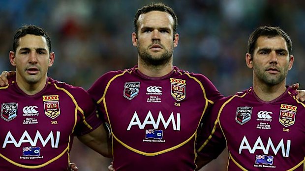 Public enemy number one: Nate Myles, centre, flanked by Billy Slater, left, and Maroons skipper Cameron Smith.