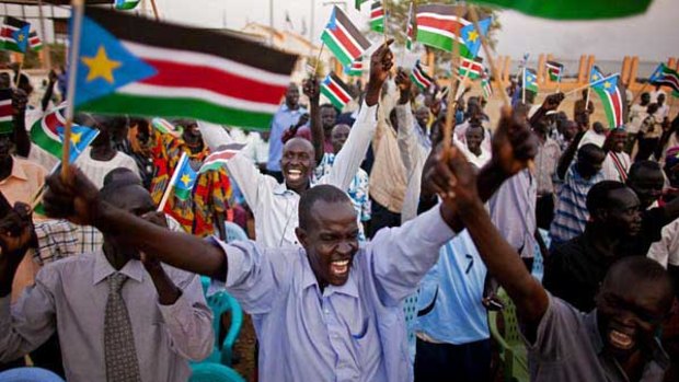 South Sudanese celebrate the formal announcement of the referendum result in the capital, Juba.