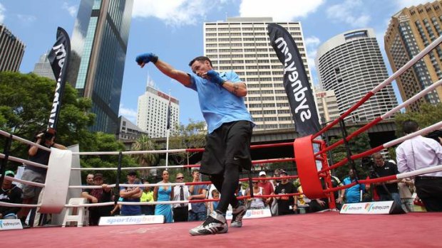 Daniel Geale working out in front of a crowd at Circular Quay.