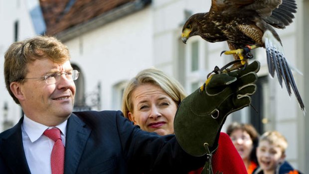 Dutch Prince Johan Friso holding a desert hawk during Queen's day in 2011.