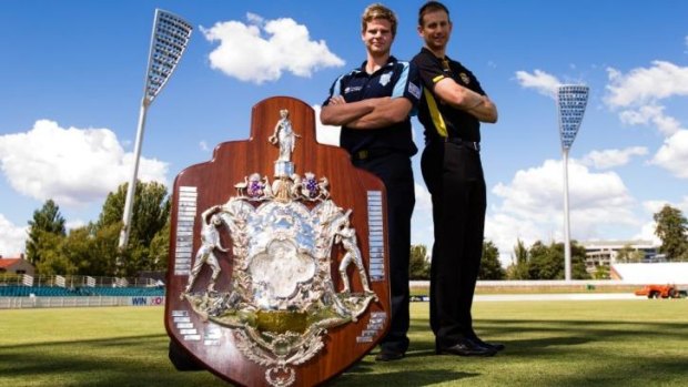 NSW captain Steve Smith (left) and WA captain Adam Voges with the Sheffield Shield.