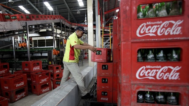 Coca-Cola Amatil is discounting the price of  carbonated soft drinks and bottled water to boost weak volumes.
