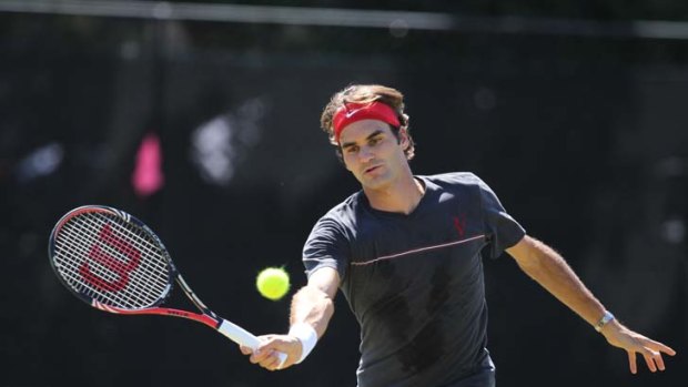 Star attraction ... Roger Federer practises at Royal Sydney Golf Club yesterday.