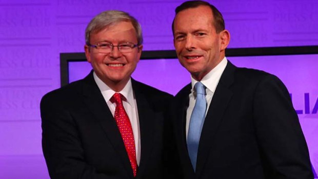 Robotic: Kevin Rudd and Tony Abbott at the debate.