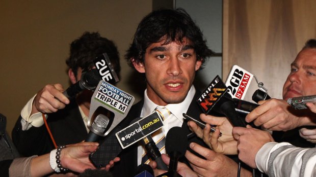 Cleared ... Queensland’s Johnathan Thurston is cornered after the NRL’s judiciary committee cleared him of a contrary-conduct charge.