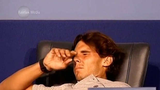 Going, going &#8230; Rafael Nadal succumbs to severe cramping at his post-match press conference.