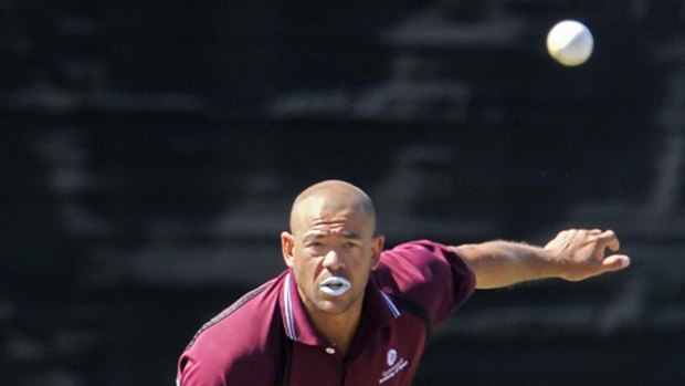 Ex-Australian all-rounder Andrew Symonds delivers a spinner at Junction Oval yesterday.