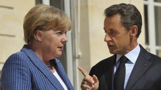 German Chancellor Angela Merkel and French President Nicolas Sarkozy ... fighting to keep Europe afloat.