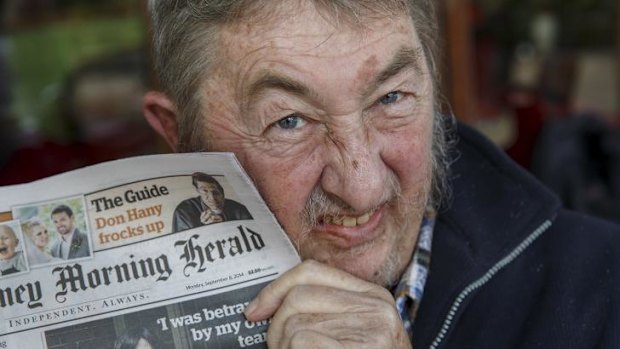 Alive and well. Mungo MacCallum holding Monday's <i>Sydney Morning Herald.</i>