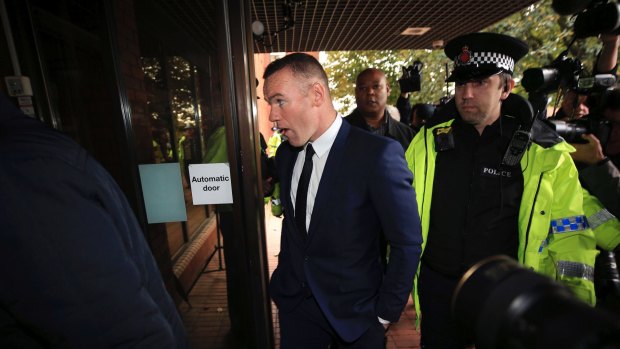 Sideline spell: Wayne Rooney has been handed a 2-year driving ban after pleading guilty to drunk driving.