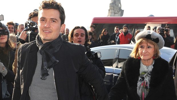 Orlando Bloom and his mum Sonia arrive for the Balenciaga show at Paris Fashion Week.