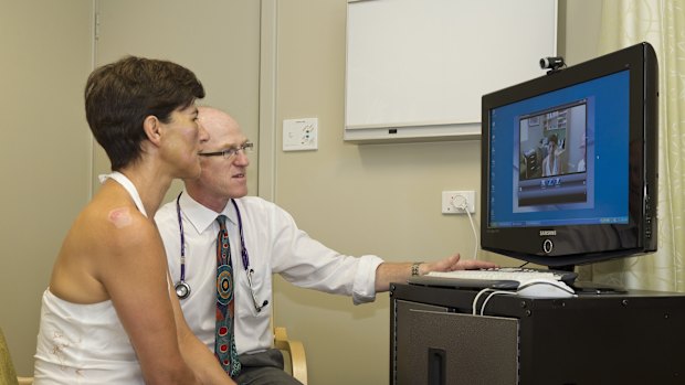 Seeing the big picture: West Australian GP Mike Civil demonstrates a video consultation last year.