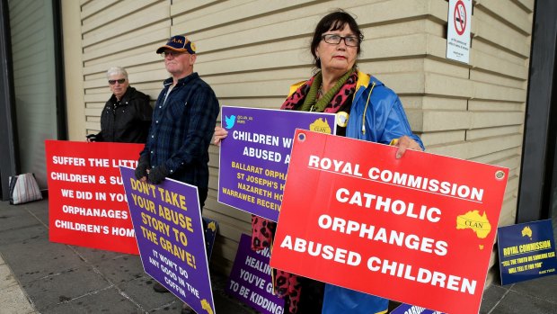 Protesters at the Royal Commission into Institutional Responses to Child Sexual Abuse in Ballarat Magistrate's Court on Tuesday.