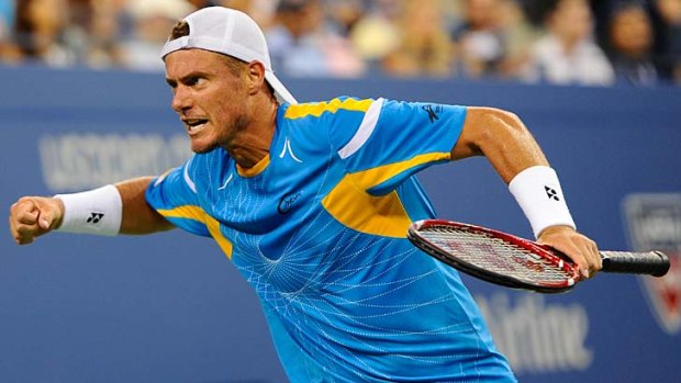 Triumph for the ages ... Lleyton Hewitt celebrates a winning point against Juan Martin Del Potro.
