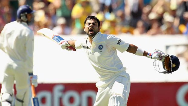 Worth the wait: Virat Kohli celebrates on reaching his century at Adelaide Oval yesterday.