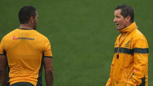 Bouncing back ... coach Robbie Deans chats with with Kurtley Beale.