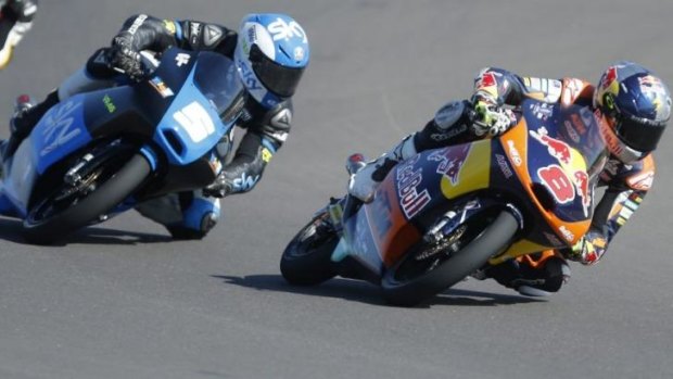 Jack Miller leads at the beginning of the Moto 3 race.