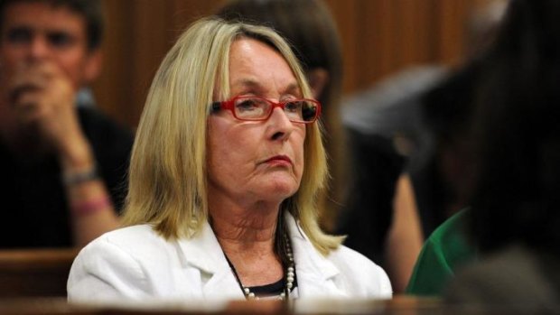 Difficult time ... June Steenkamp, mother of Reeva Steenkamp, listens to the text messages given in evidence by mobile phone analyst  Francois Moller during the Oscar Pistorius murder trial. 