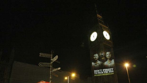 City sledge . . . a farewell message from Ricky Ponting and Michael Clarke to England's departing cricketers was projected by laser onto Big Ben on Thursday to promote the coming Ashes series.