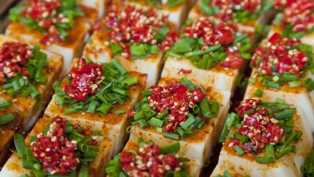 Beautifully presented snacks on a street stall in Chengdu whet one's appetite.