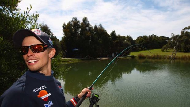 Change of pace &#8230; Casey Stoner goes fishing for trout after slamming critics' claims over his mental strength.