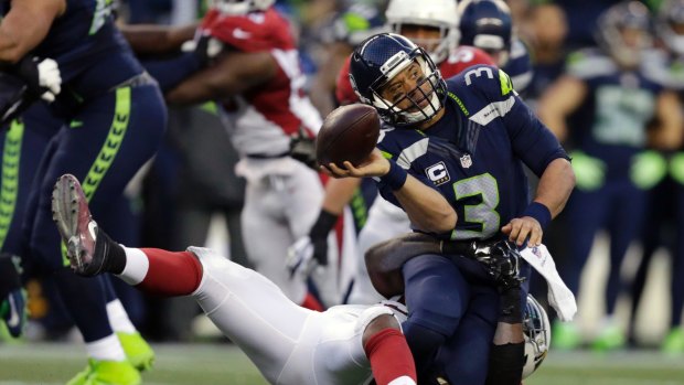 Under pressure: Seattle Seahawks quarterback Russell Wilson.