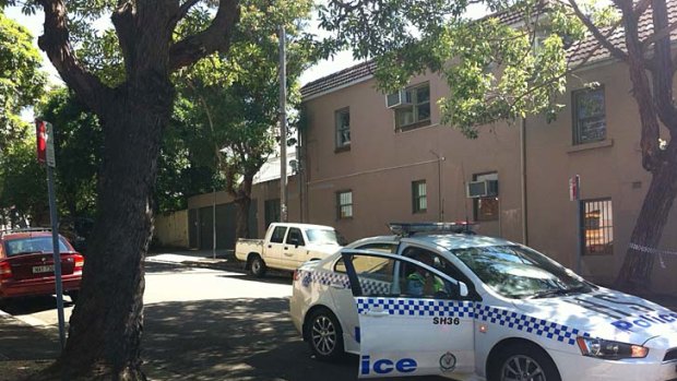 Looking for evidence ... police are investigating after a woman was stabbed in Surry Hills.