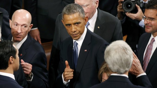 President Barack Obama gives a thumbs up to Secretary of State John Kerry after his State of the Union address earlier this week, but the thumbs down to a metadata proposal.