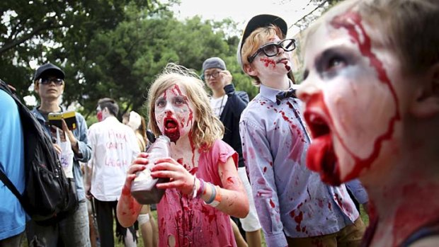 Every day I'm shufflin': Living dead children and adults alike take part in the annual Sydney Zombie Walk.