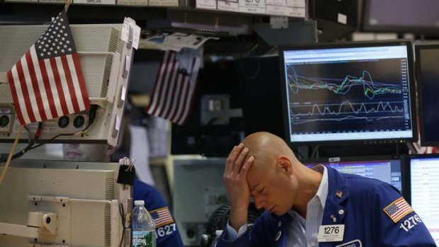 Don't look &#8230; pain on the floor of the New York Stock Exchange as the Dow Jones drops 277 points on Friday.