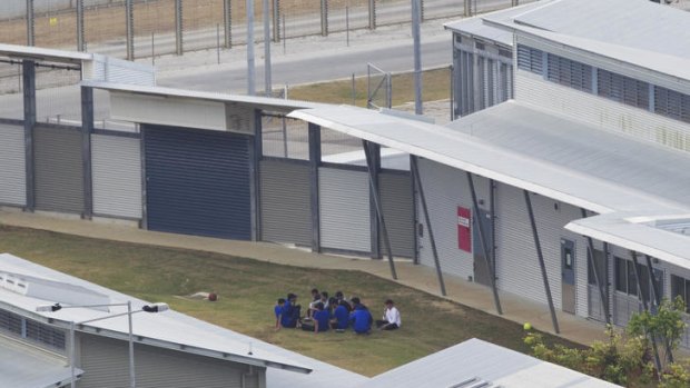 Detainees, believed to be recent arrivals, being held at The Christmas Island Immigration Detention Centre.