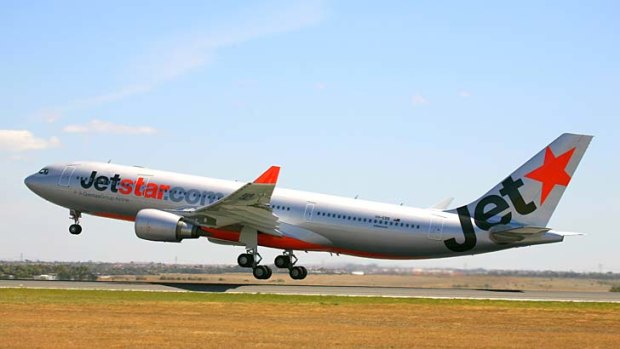 Angry passengers have held a Jetstar crew hostage after a flight delay in China.
