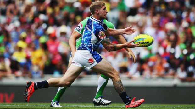 Caught the eye: Sam Tomkins in action for the Warriors during the Auckland Nines.