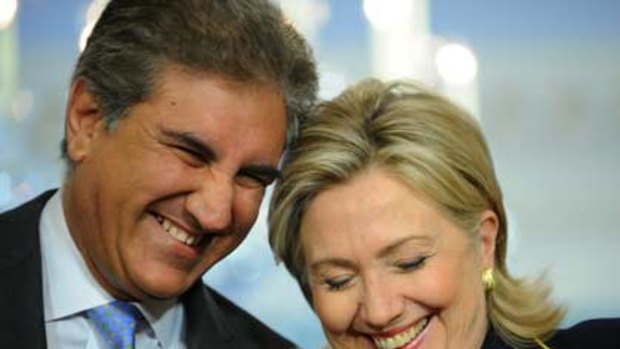 "Today, I am a happy and satisfied man"...Pakistan's Foreign Minister, Shah Mehmood Qureshi, with the US secretary of state, Hillary Clinton, in Washington.