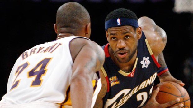 Los Angeles Lakers' Kobe Bryant (L) defends against Cleveland Cavaliers' LeBron James, in 2009.