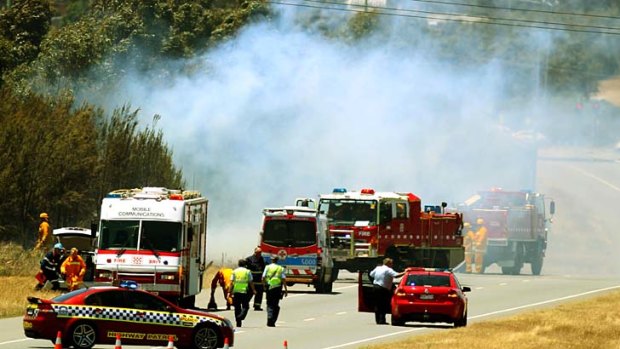 Under control &#8230; fire crews battle a fire near Dandenong, in Victoria, where water bombers were called to help put out the blaze.